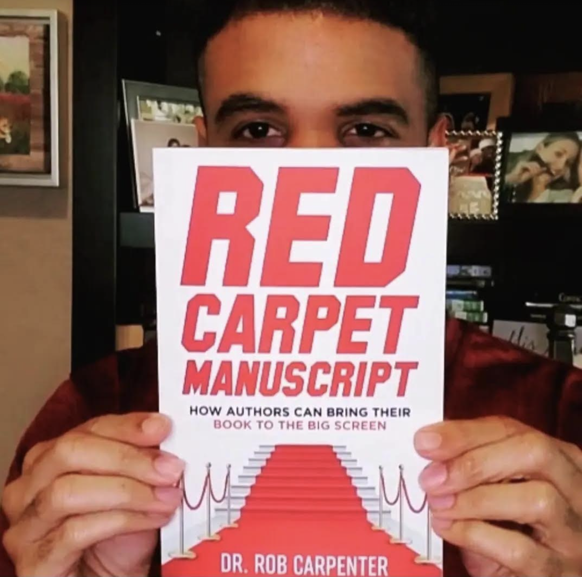 Dr. Rob with his book, "Red Carpet Manuscript"